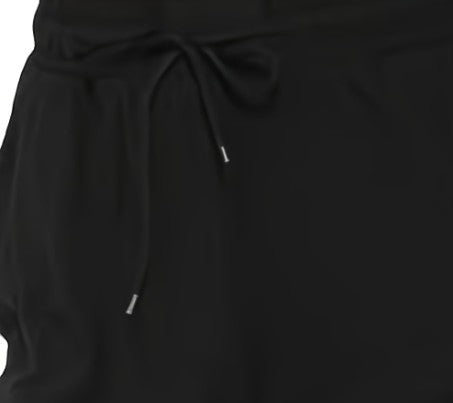 Femmes de pilotes Jogging Soft noir en matière douce et fluide, coupe moderne avec cordon de serrage à la taille.